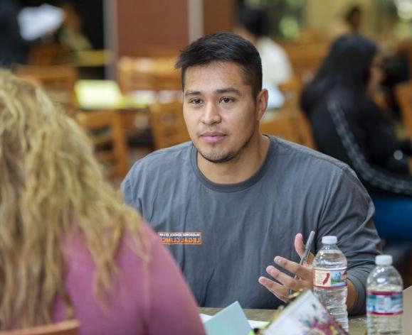 Law student advising at immigration clinic